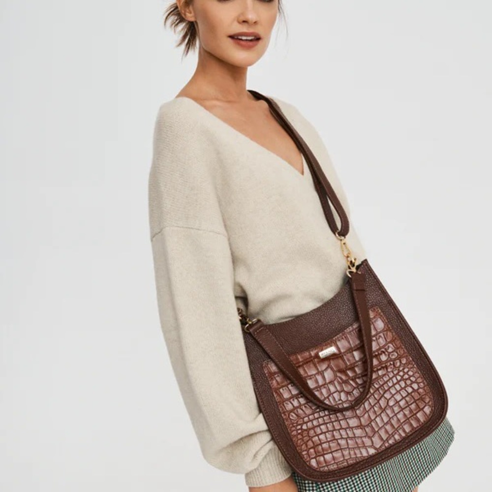 Leather bag in black color made in Poland .
